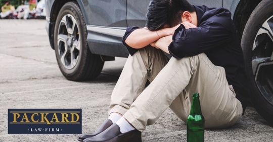 driver with a beer bottle